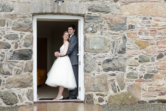 A tea length Enzoani wedding dress for an intimate Real Wedding in North Wales (c) Gill Jones Photography